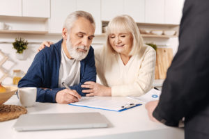 An elder couple estate planning with a Speights Lawyer